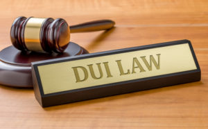 Gavel and name plate that says DUI LAW for a DUI lawyer Peoria IL